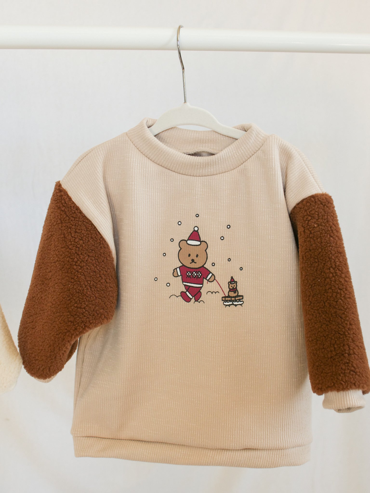 Santa Pulling Sled Sherpa Sleeve Sweatshirt